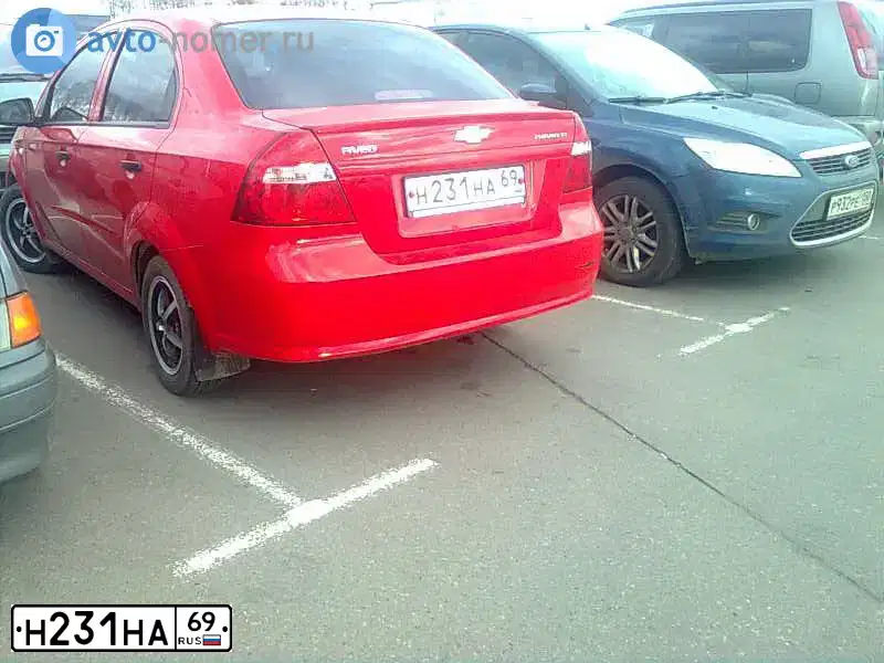 Фото автомобиля CHEVROLET AVEO, 2008 — госномер Н499СХ69. Цвет: Красный