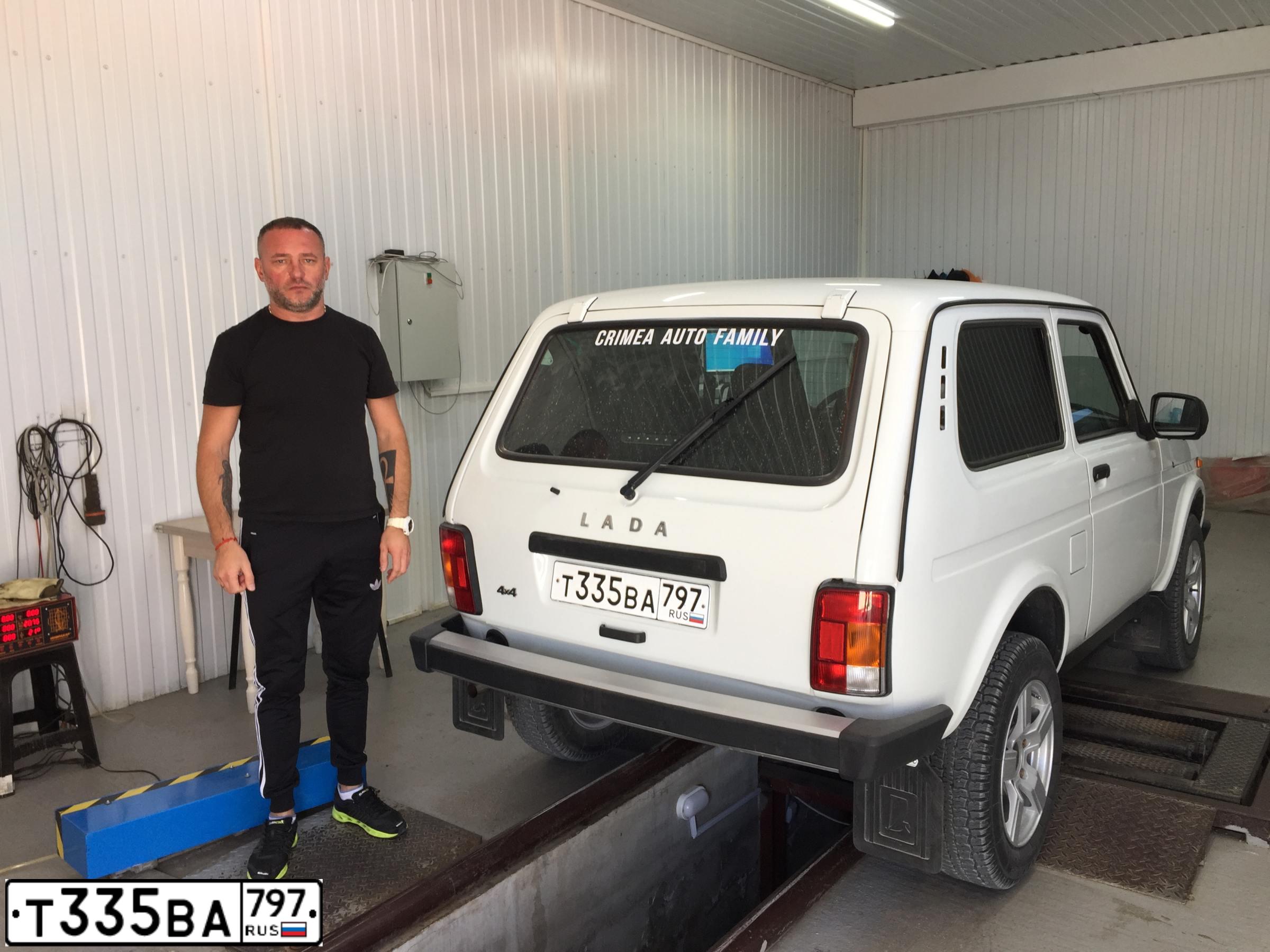 Фото автомобиля LADA 2121 NIVA, 2019 — госномер Н902ОМ82. Цвет: Белый