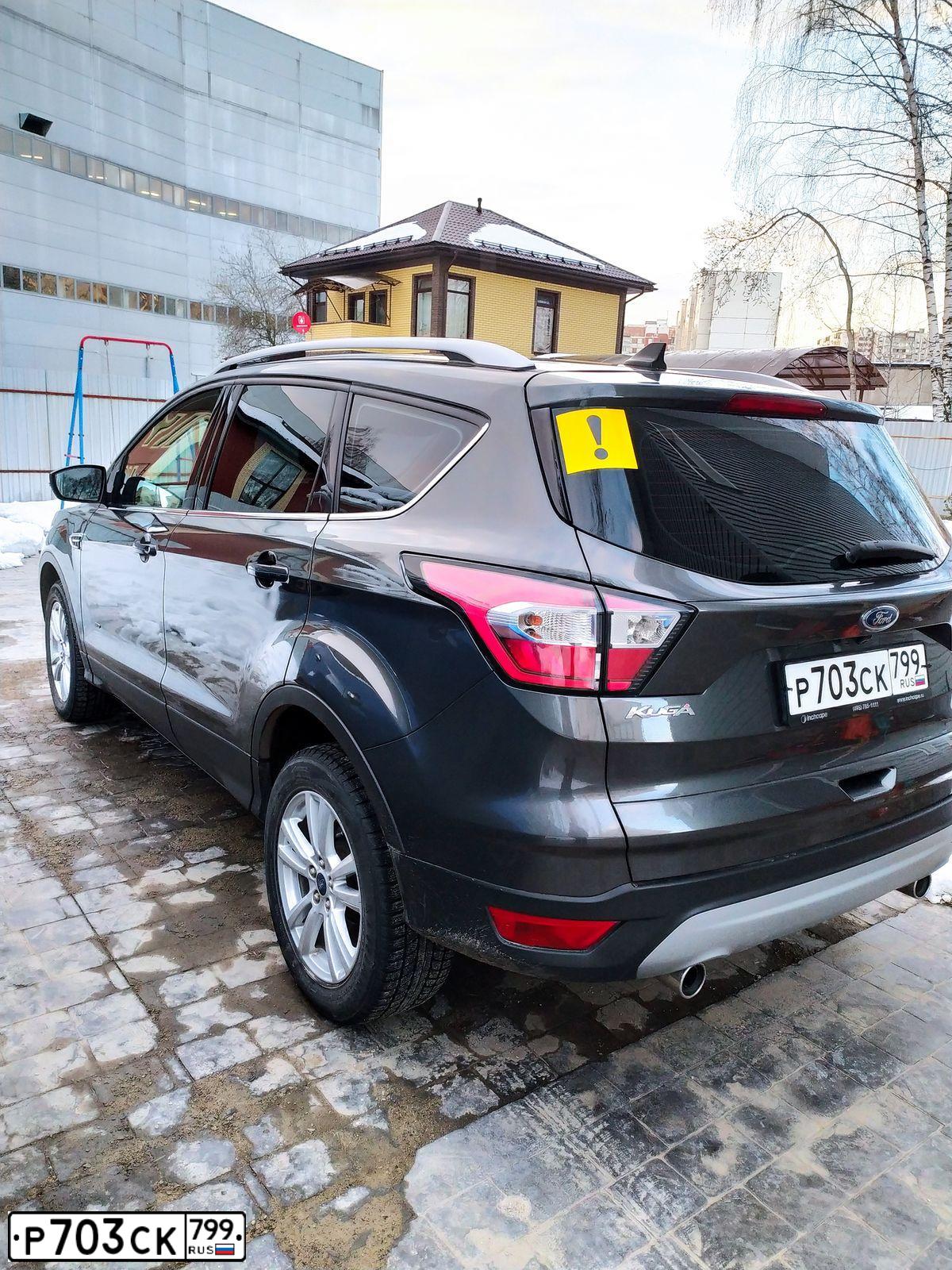 Фото автомобиля FORD KUGA, 2017 — госномер Р703СК799. Цвет: Серый
