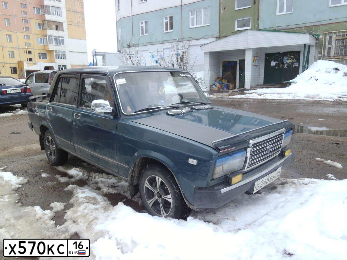 Фото автомобиля MITSUBISHI LANCER, 2006 — госномер М402УМ716. Цвет: СВЕТЛО-СЕРО-ЗЕЛЕНЫЙ
