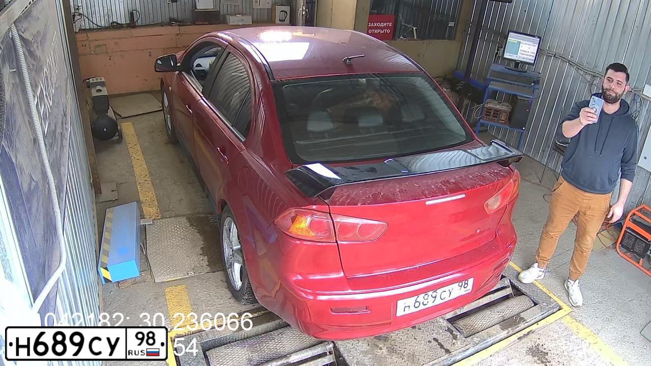 Фото автомобиля MITSUBISHI LANCER, 2008 — госномер А039ВВ185. Цвет: Красный