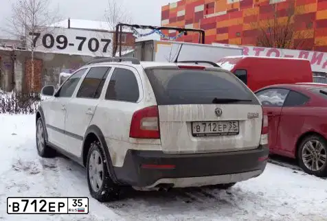 Фото автомобиля SKODA OCTAVIA, 2013 — госномер В712ЕР35. Цвет: Белый