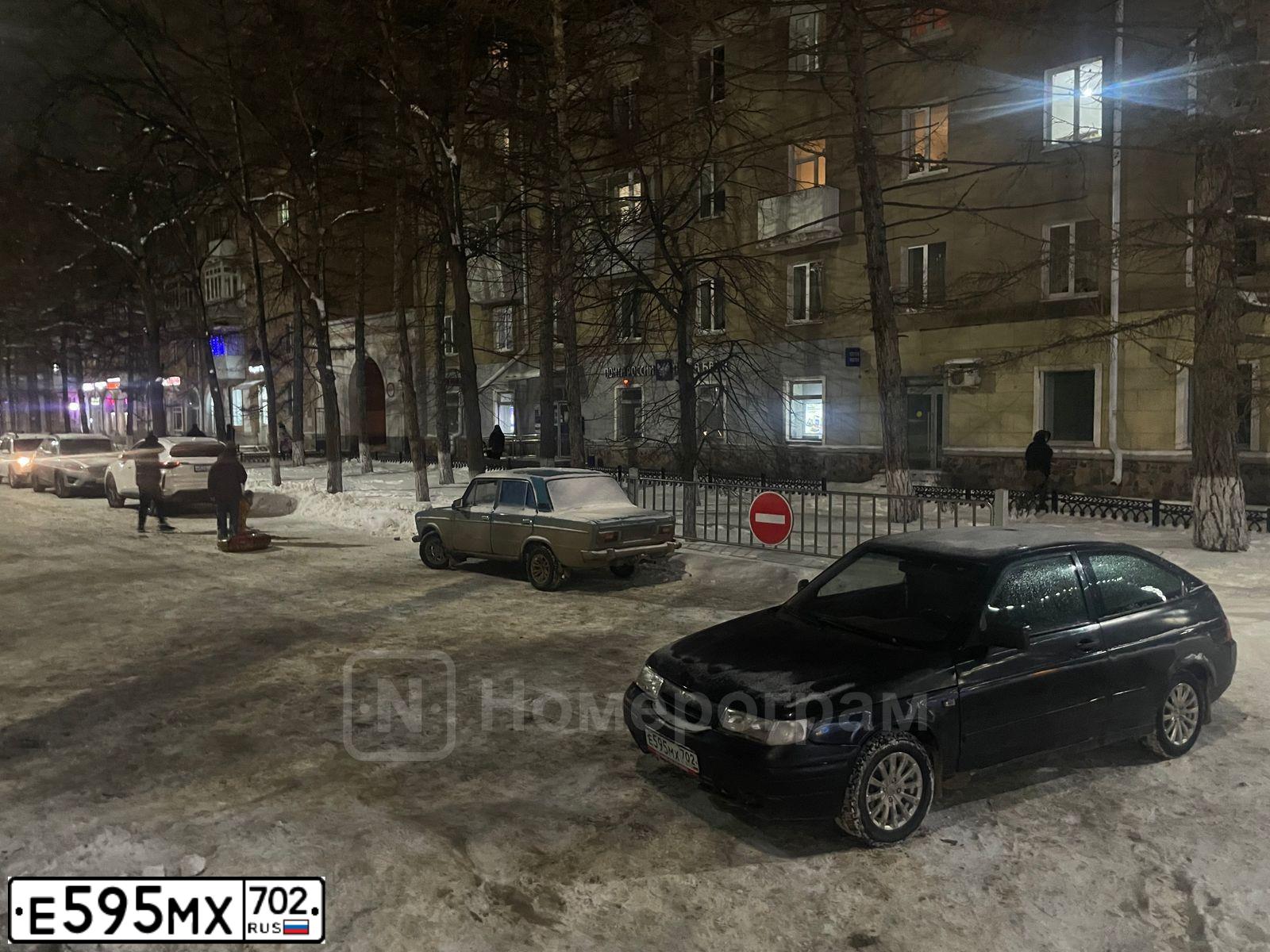 Фото автомобиля LADA 2112 LADA, 2007 — госномер Е595МХ702. Цвет: ГРАФИТОВЫЙ МЕТАЛЛИК