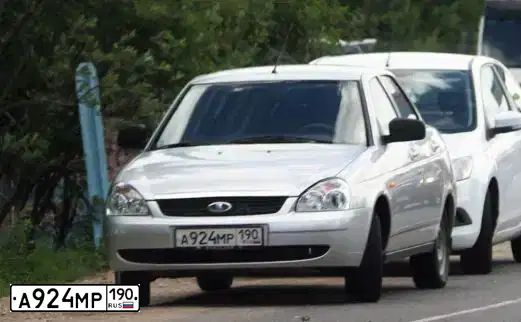 Фото автомобиля CHEVROLET LACETTI, 2011 — госномер У892МК31. Цвет: Белый