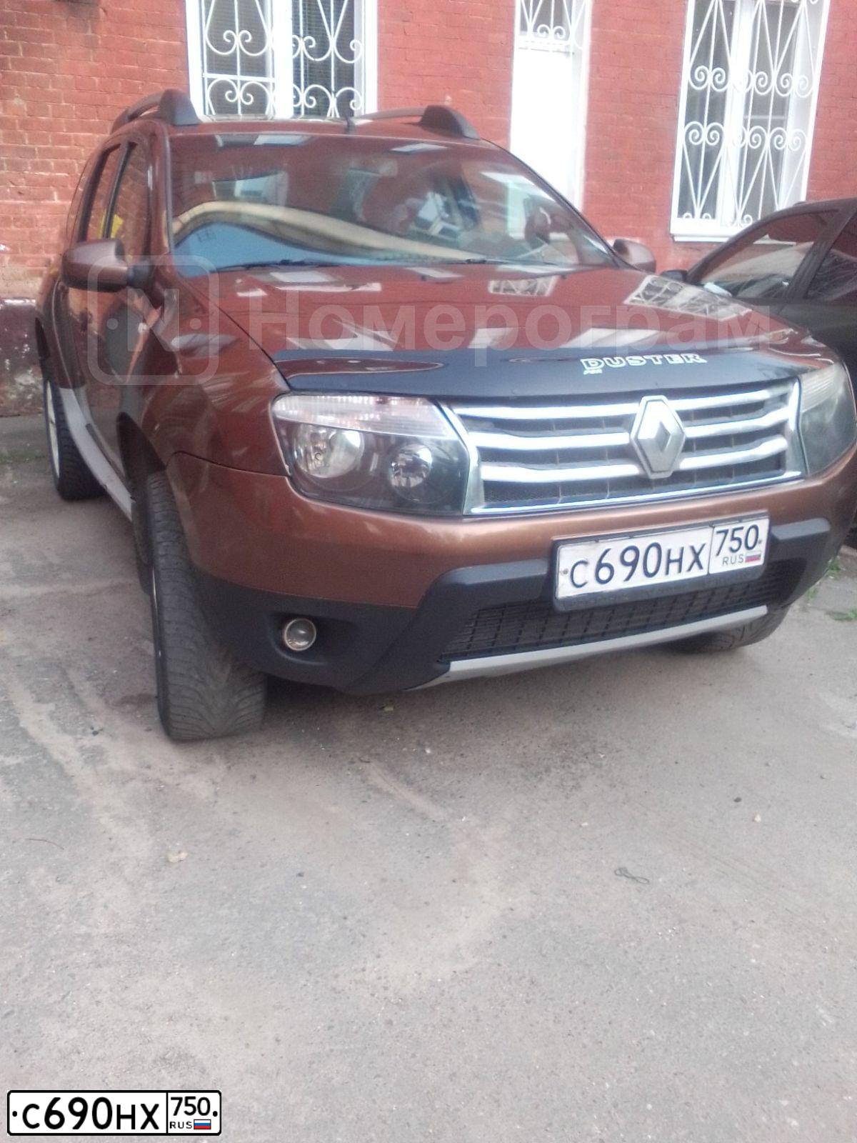 Фото автомобиля RENAULT DUSTER, 2012 — госномер М294ТХ21. Цвет: Коричневый