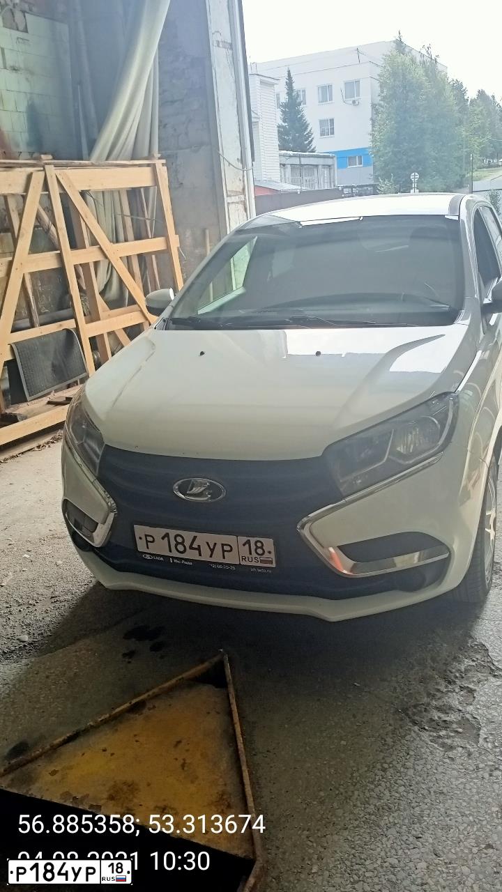 Фото автомобиля LADA XRAY, 2016 — госномер Р184УР18. Цвет: БЕЛЫЙ