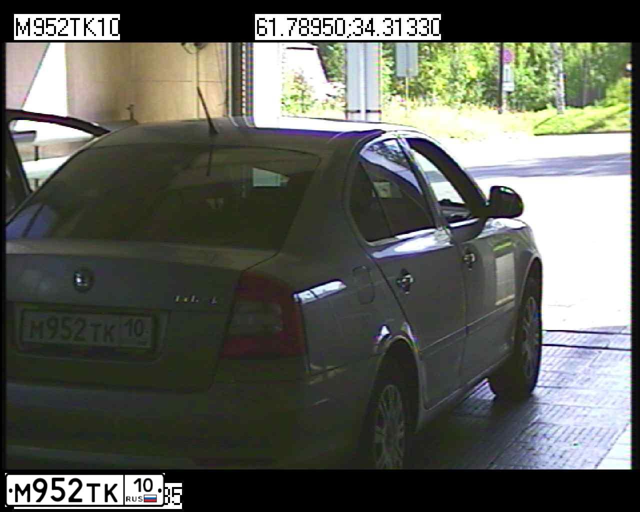 Фото автомобиля SKODA OCTAVIA, 2012 — госномер М952ТК10. Цвет: Серый