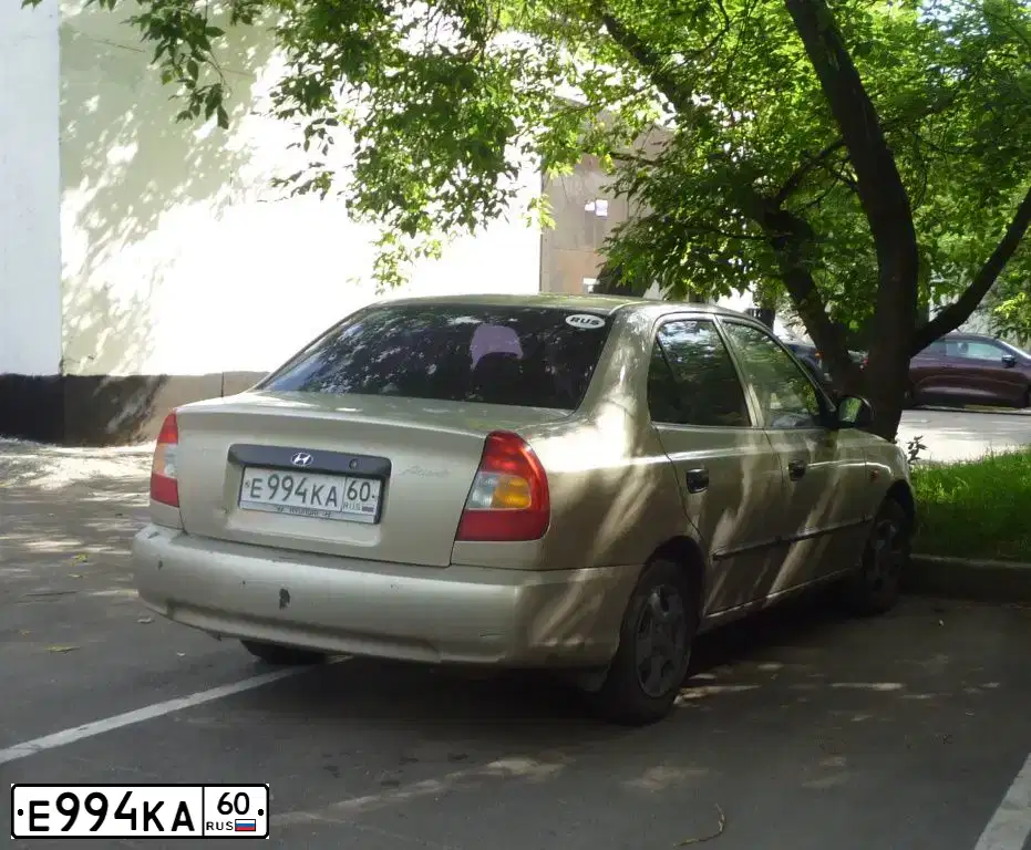 Фото автомобиля TAGAZ ACCENT, 2004 — госномер Е994КА60. Цвет: БЕЖЕВЫЙ
