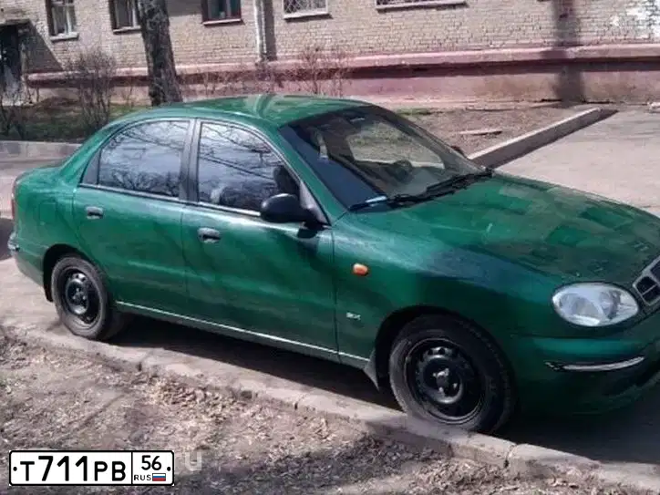 Фото автомобиля ZAZ LANOS, 2006 — госномер Т711РВ56. Цвет: ЗЕЛЕНЫЙ