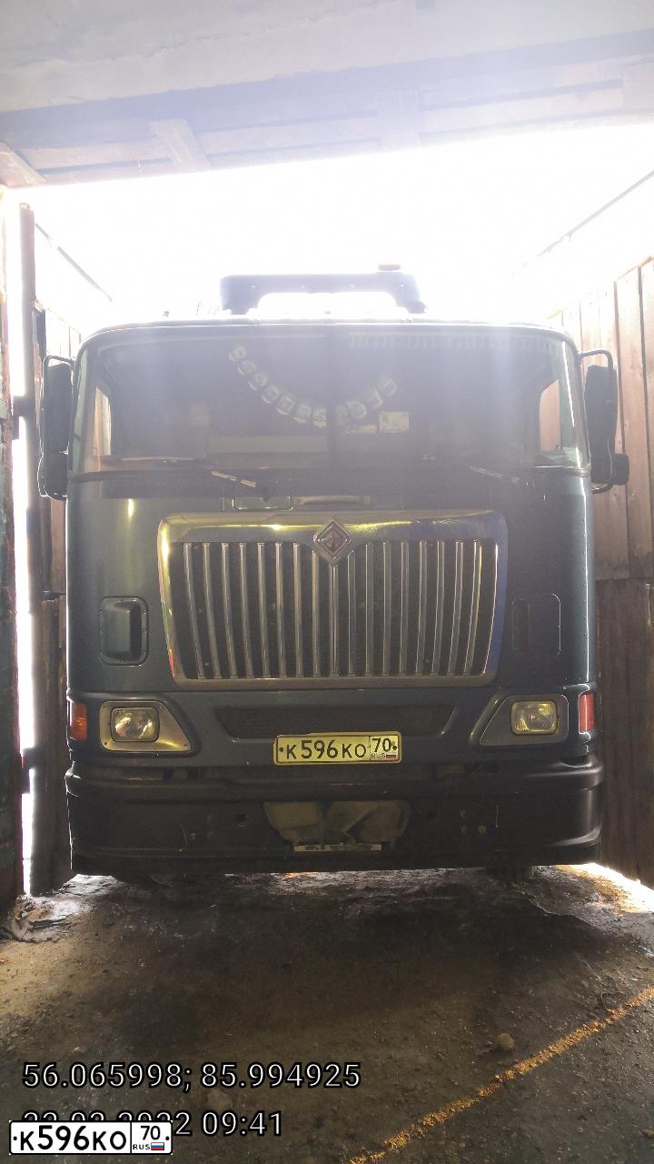 Фото автомобиля INTERNATIONAL HEAVY TRUCK 8500-9900, 2009 — госномер К596КО70. Цвет: СИНИЙ