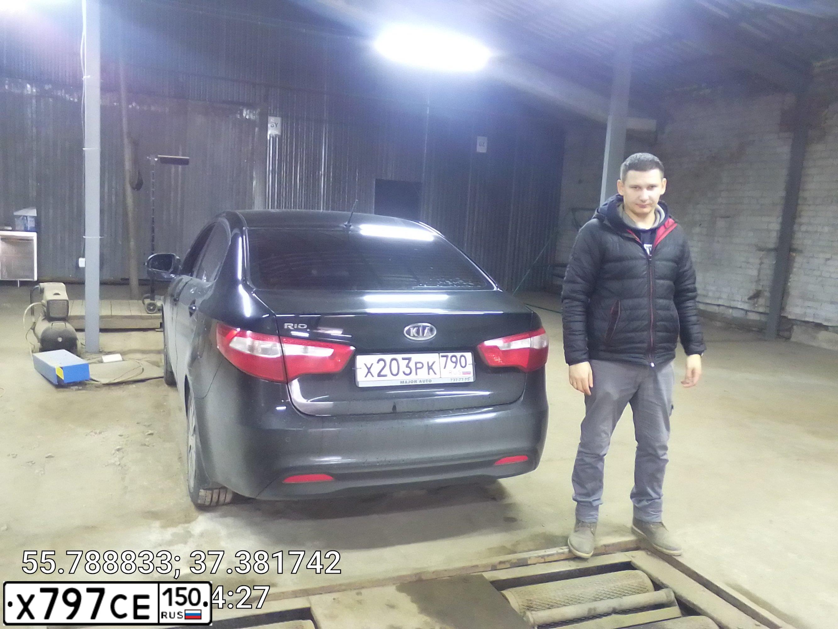 Фото автомобиля KIA RIO, 2011 — госномер Х797СЕ150. Цвет: ЧЕРНЫЙ