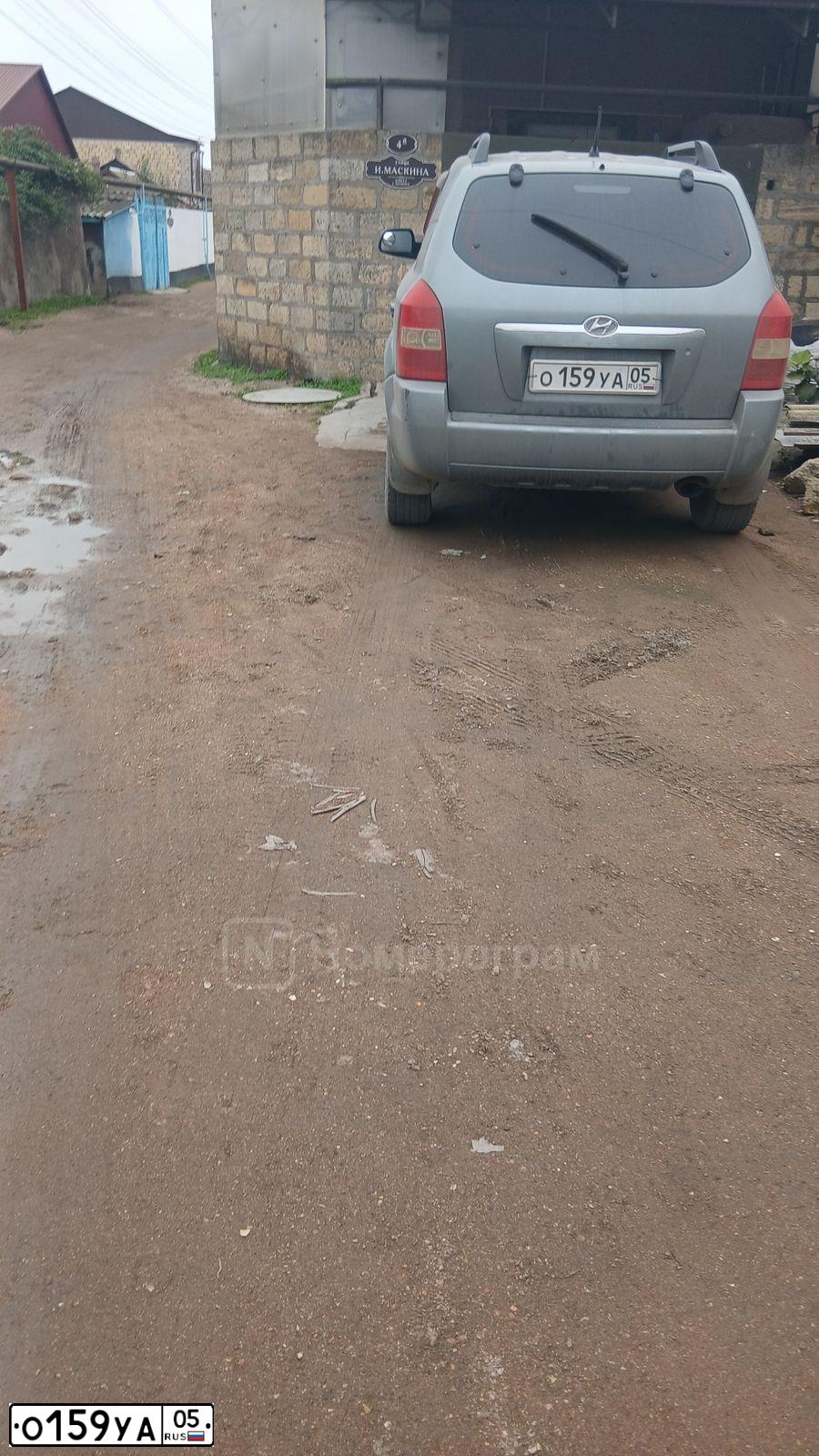 Фото автомобиля HYUNDAI TUCSON, 2006 — госномер О159УА05. Цвет: СВЕТЛО-ГОЛУБОЙ