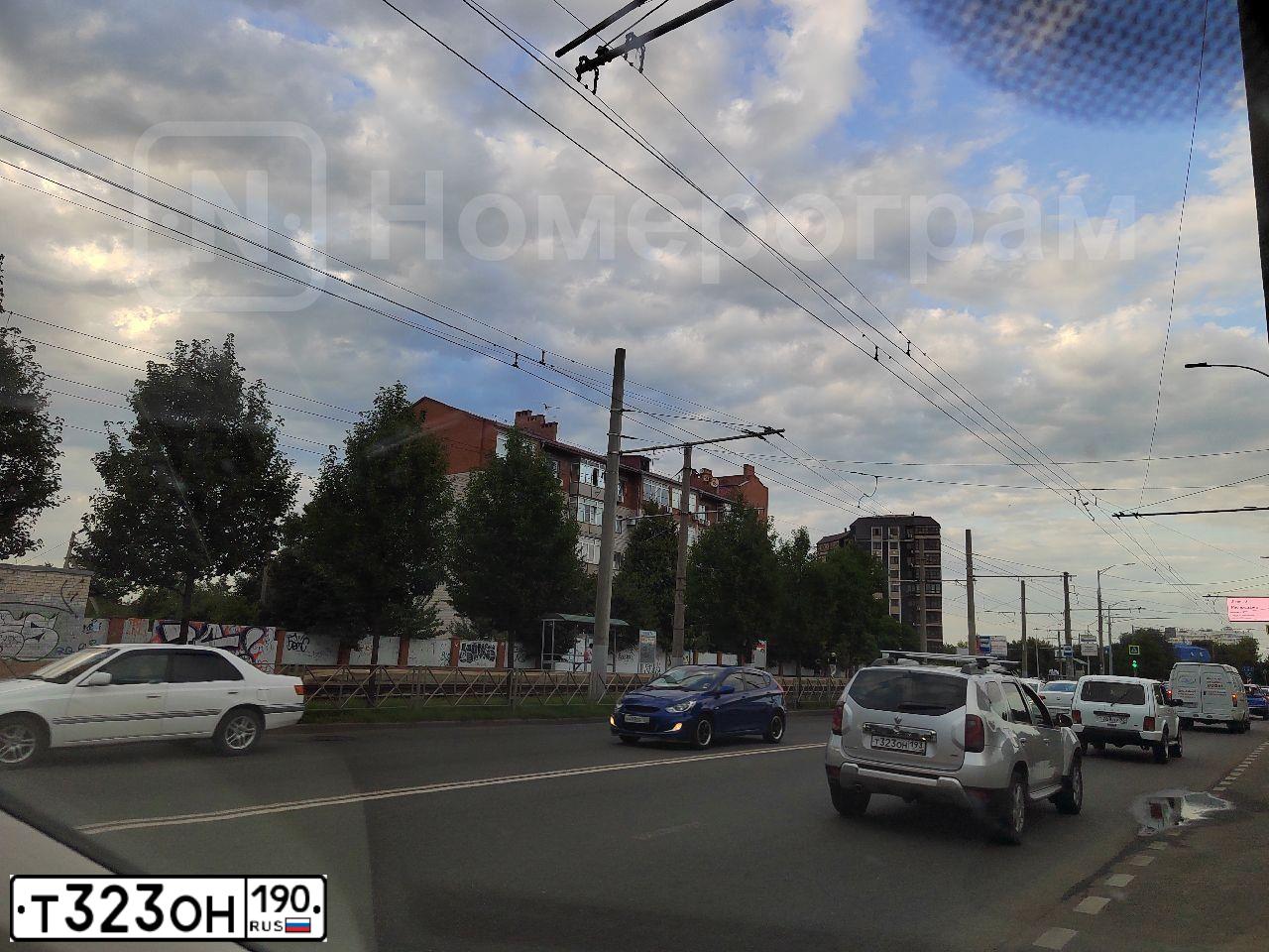 Фото автомобиля MITSUBISHI LANCER, 2007 — госномер Т323ОН190. Цвет: ЧЕРНЫЙ