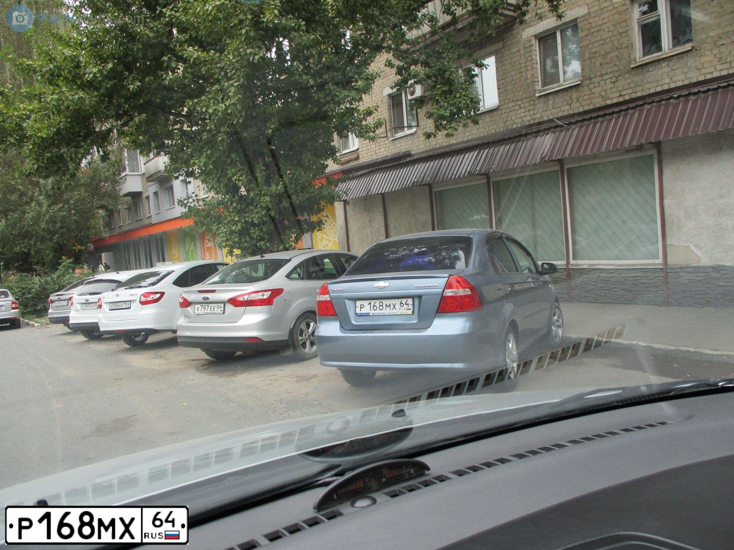 Фото автомобиля LADA 2107, 2006 — госномер К446ТР64. Цвет: ТЕМНО ЗЕЛЕНЫЙ