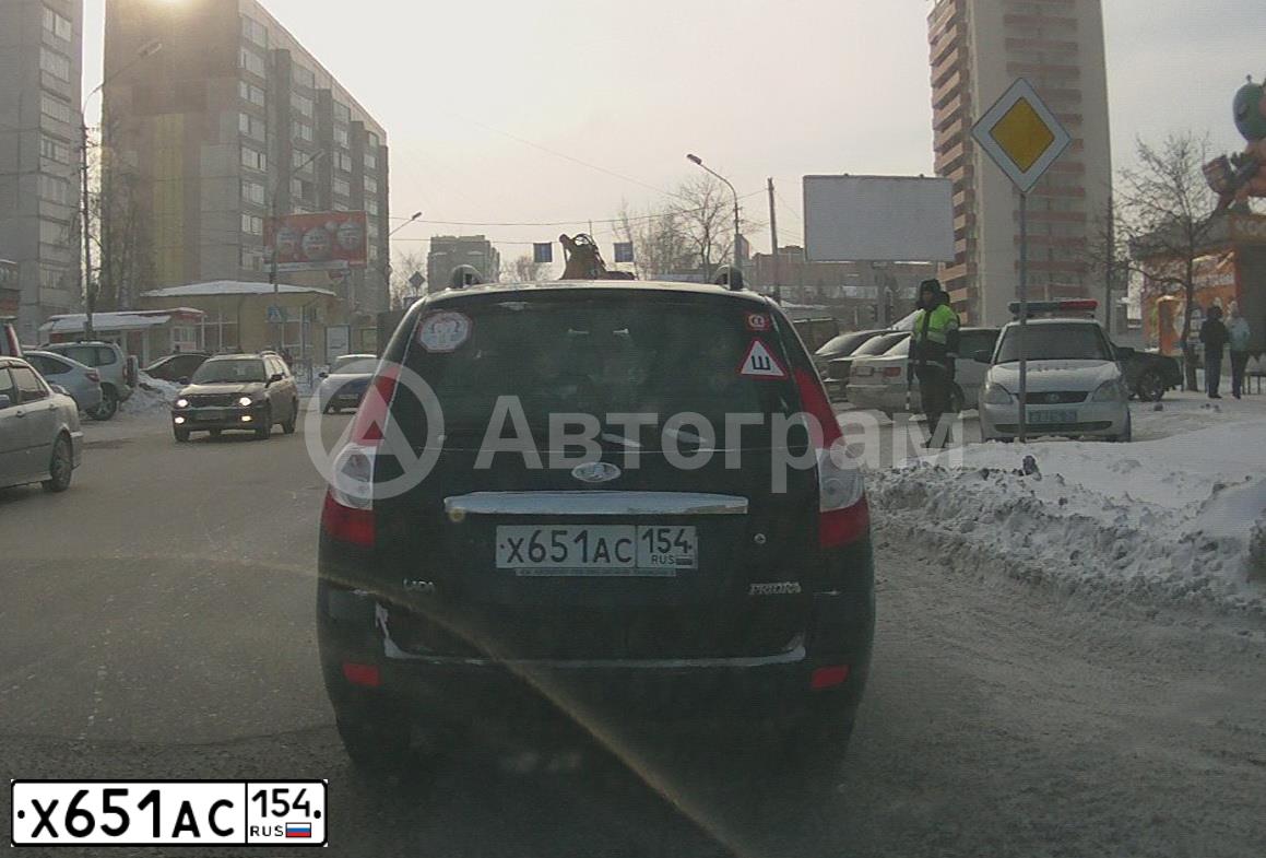 Фото автомобиля LADA 2171 PRIORA, 2011 — госномер Х651АС154. Цвет: СИНЕ-ЧЕРНЫЙ