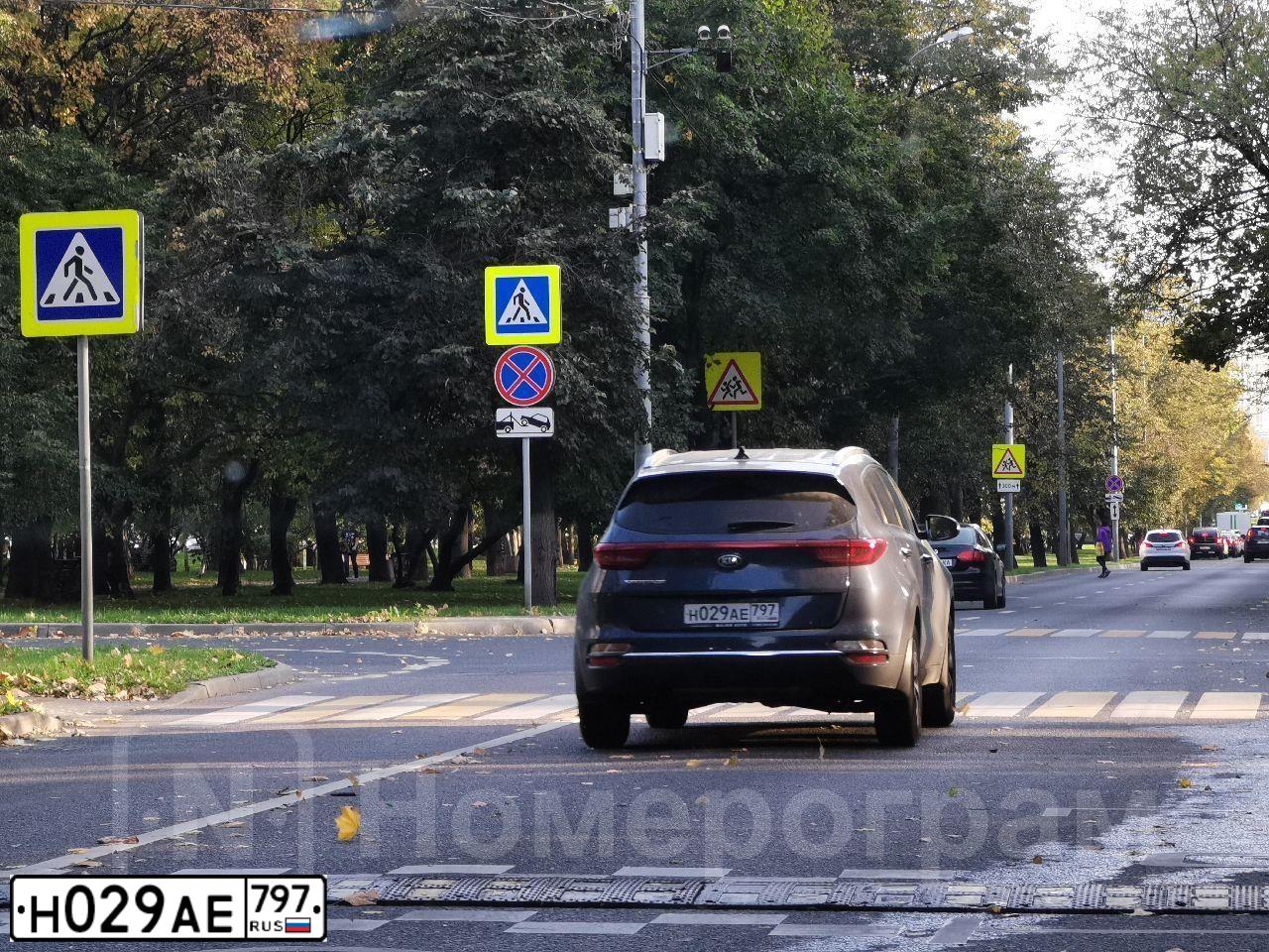 Фото автомобиля KIA SPORTAGE, 2020 — госномер Н029АЕ797. Цвет: ТЕМНО-СИНИЙ