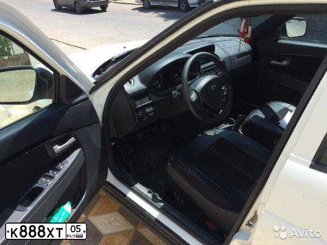 Фото автомобиля LADA 2121 NIVA, 2015 — госномер Р349АЕ05. Цвет: ЧЕРНЫЙ