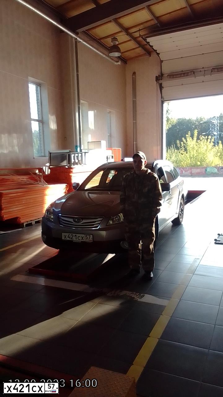 Фото автомобиля SUBARU LEGACY, 2010 — госномер Е878ВТ57. Цвет: СЕРЫЙ