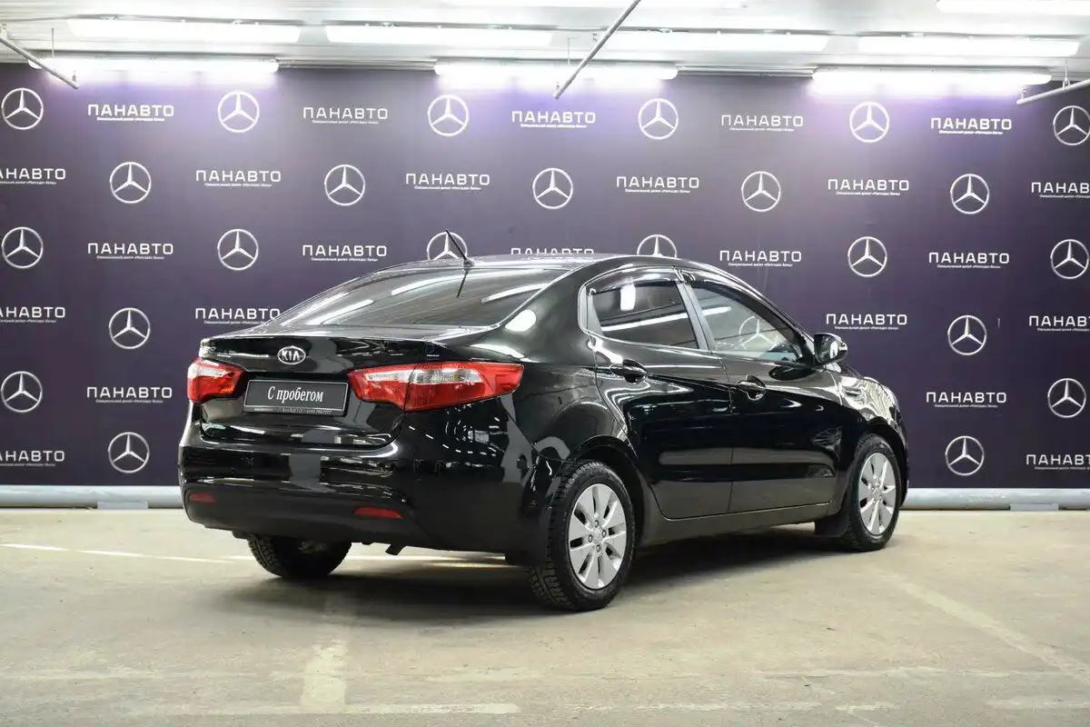 Фото автомобиля KIA RIO, 2012 — госномер М579КС67. Цвет: ЧЕРНЫЙ