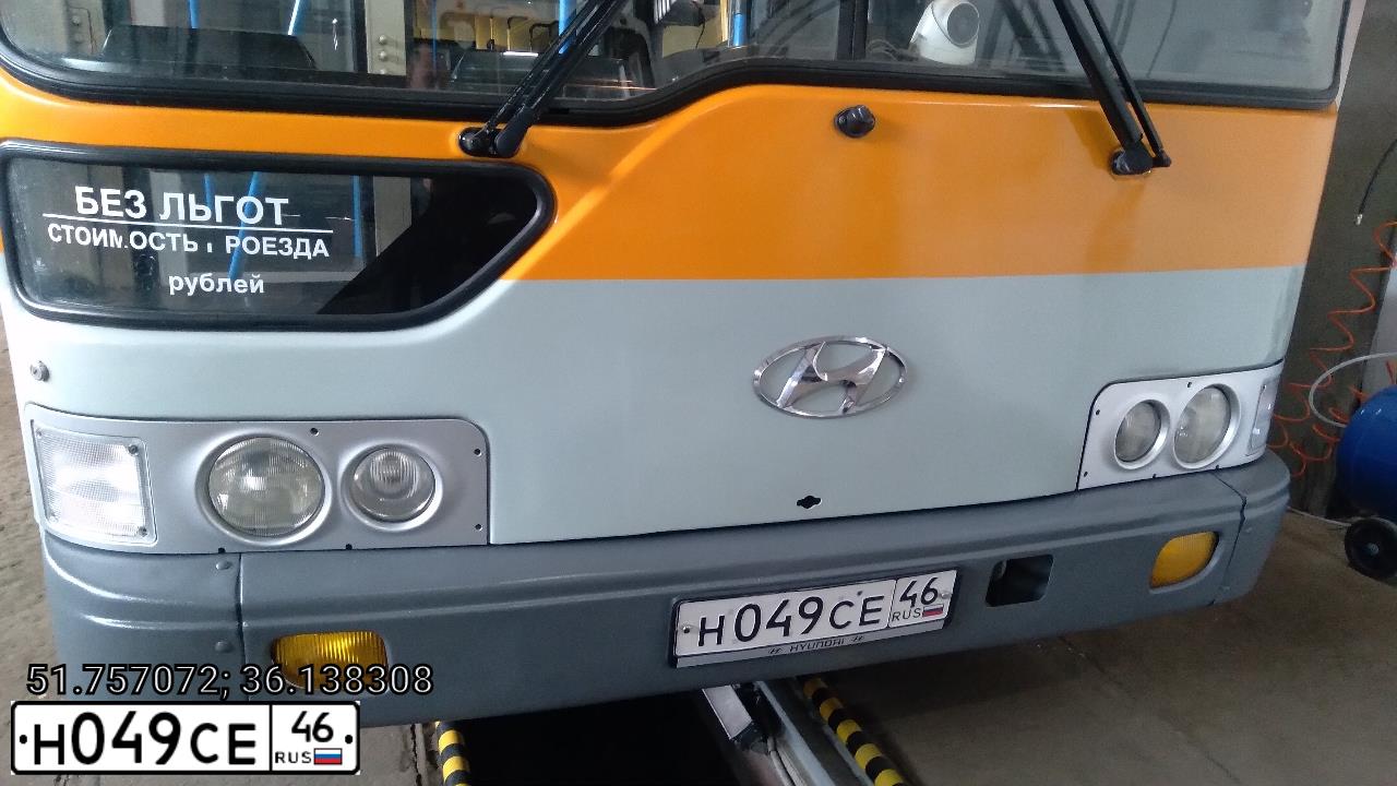 Фото автомобиля HYUNDAI AERO, 2007 — госномер Н049СЕ46. Цвет: ЖЕЛТЫЙ СЕРЫЙ