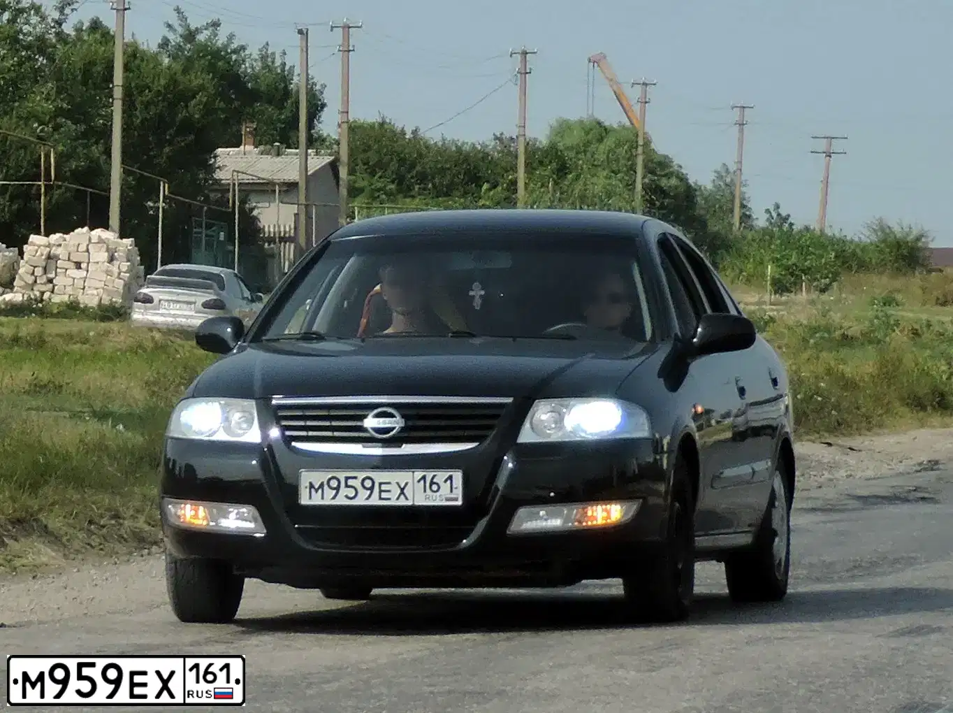 Фото автомобиля NISSAN ALMERA, 2008 — госномер М959ЕХ161. Цвет: ЧЕРНЫЙ