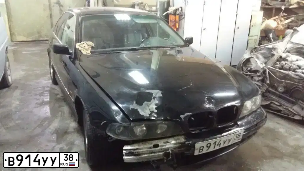 Фото автомобиля BMW SERIE 5, 1997 — госномер М914ВА138. Цвет: ЧЕРНЫЙ