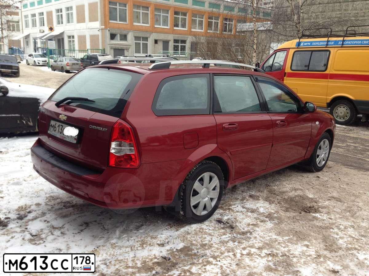 Фото автомобиля LADA LARGUS, 2012 — госномер М619СС178. Цвет: СЕРО-БЕЖЕВЫЙ