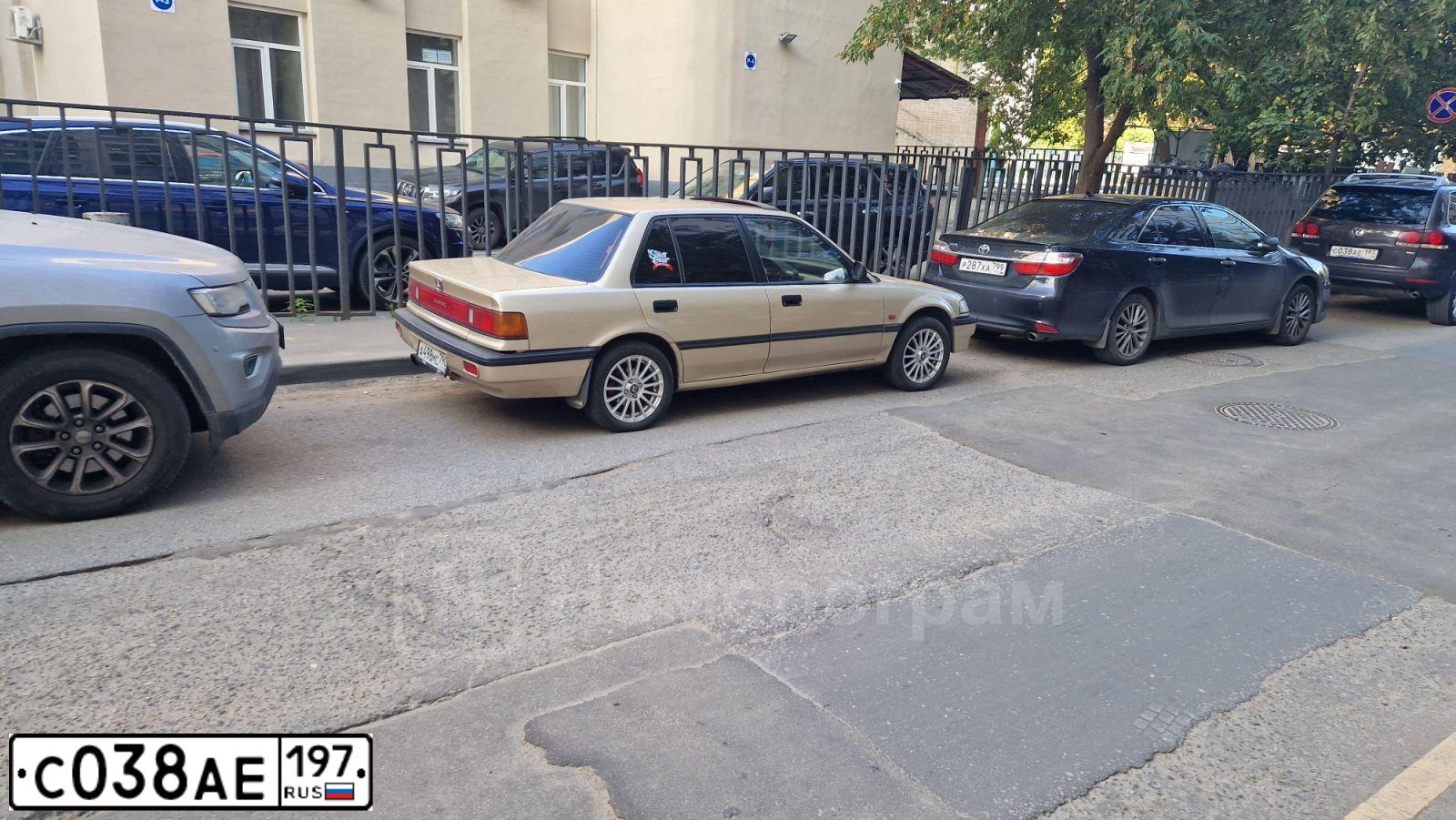 Фото автомобиля VOLKSWAGEN TOUAREG, 2010 — госномер С038АЕ197. Цвет: СЕРЫЙ ТЕМНЫЙ