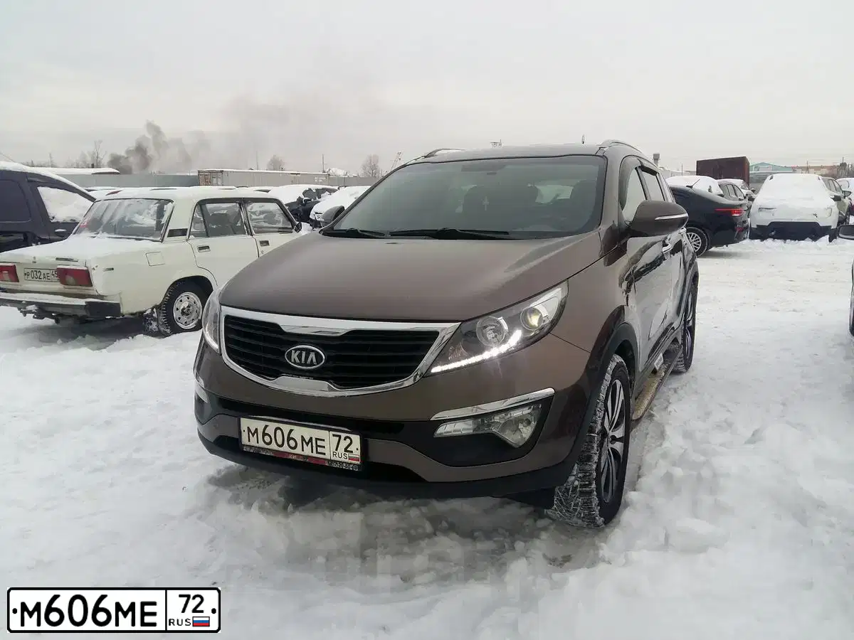 Фото автомобиля KIA SPORTAGE, 2010 — госномер Н794ВМ196. Цвет: Коричневый