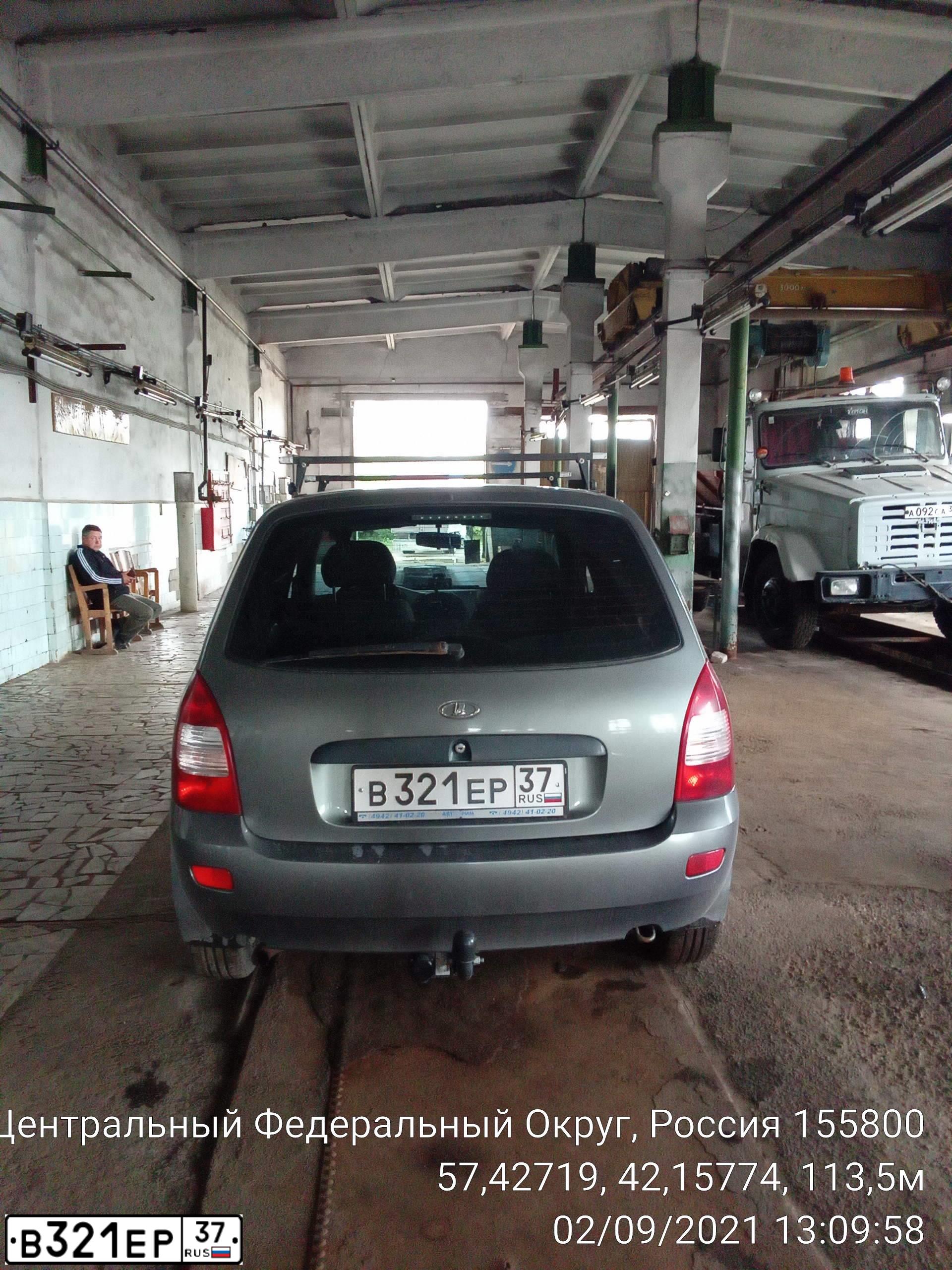 Фото автомобиля LADA 1117 KALINA, 2010 — госномер В321ЕР37. Цвет: ТЕМНО-СЕРЫЙ