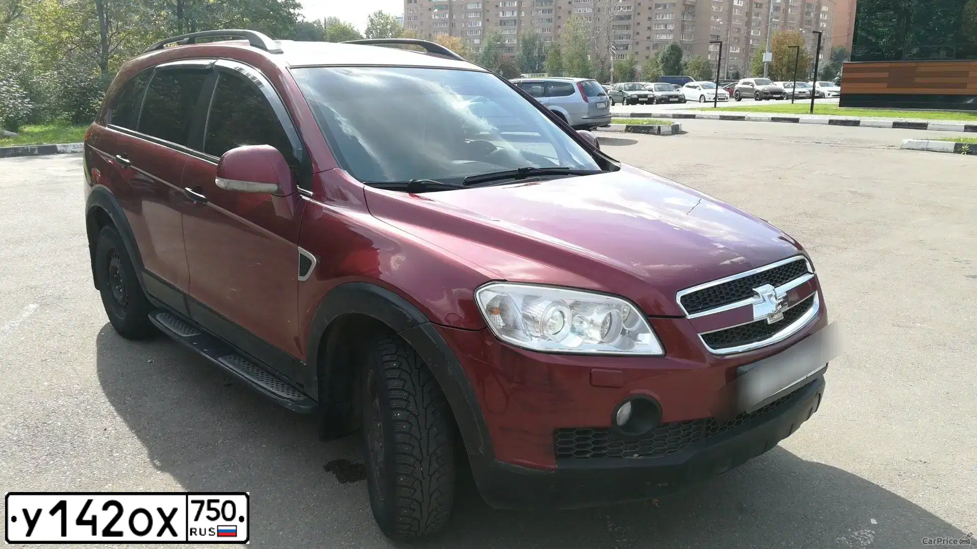 Фото автомобиля CHEVROLET CAPTIVA, 2007 — госномер М147ТЕ62. Цвет: КРАСНЫЙ