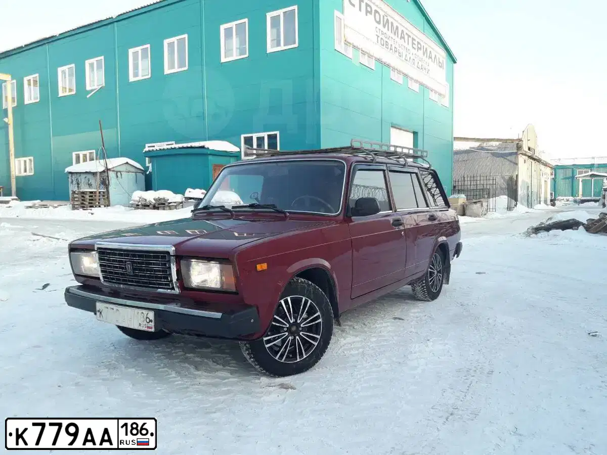 Фото автомобиля LADA KALINA, 2012 — госномер Х061ХС86. Цвет: СЕРЕБРИСТО-КРАСНЫЙ