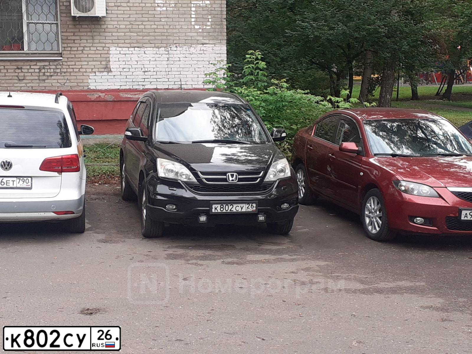 Фото автомобиля HONDA CR-V, 2010 — госномер К802СУ26. Цвет: ЧЕРНЫЙ
