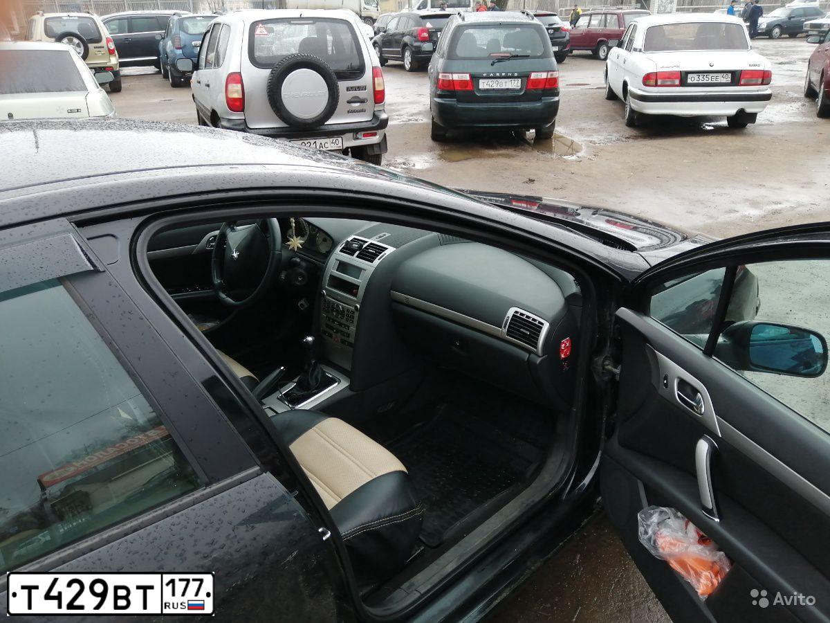 Фото автомобиля KIA CARENS, 2005 — госномер О737СН40. Цвет: Темно-зеленый
