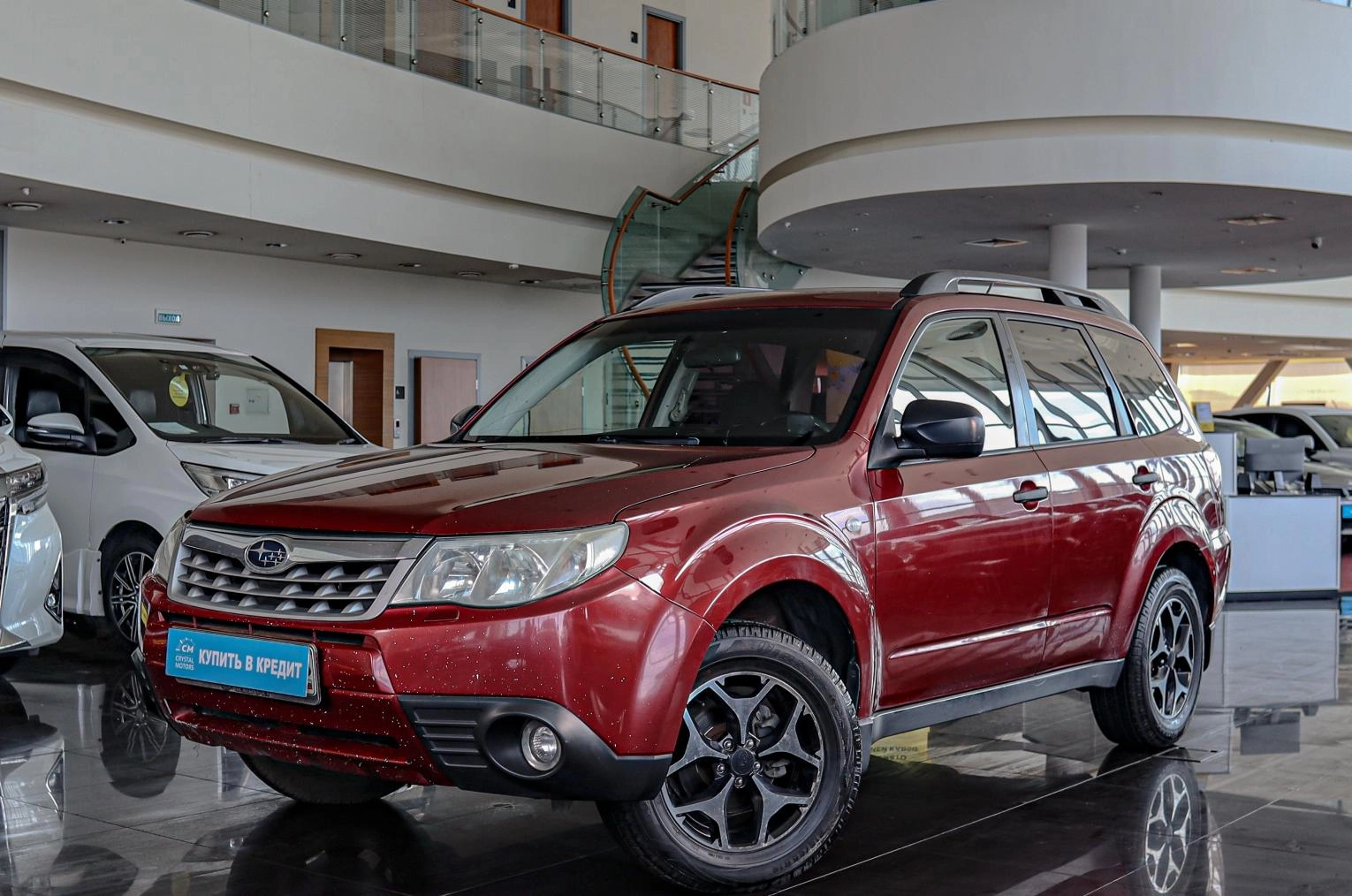 Фото автомобиля SUBARU FORESTER, 2011 — госномер К512МК178. Цвет: Красный