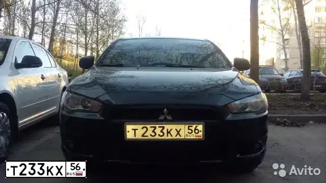 Фото автомобиля MITSUBISHI LANCER, 2007 — госномер А727МО702. Цвет: ЧЕРНЫЙ