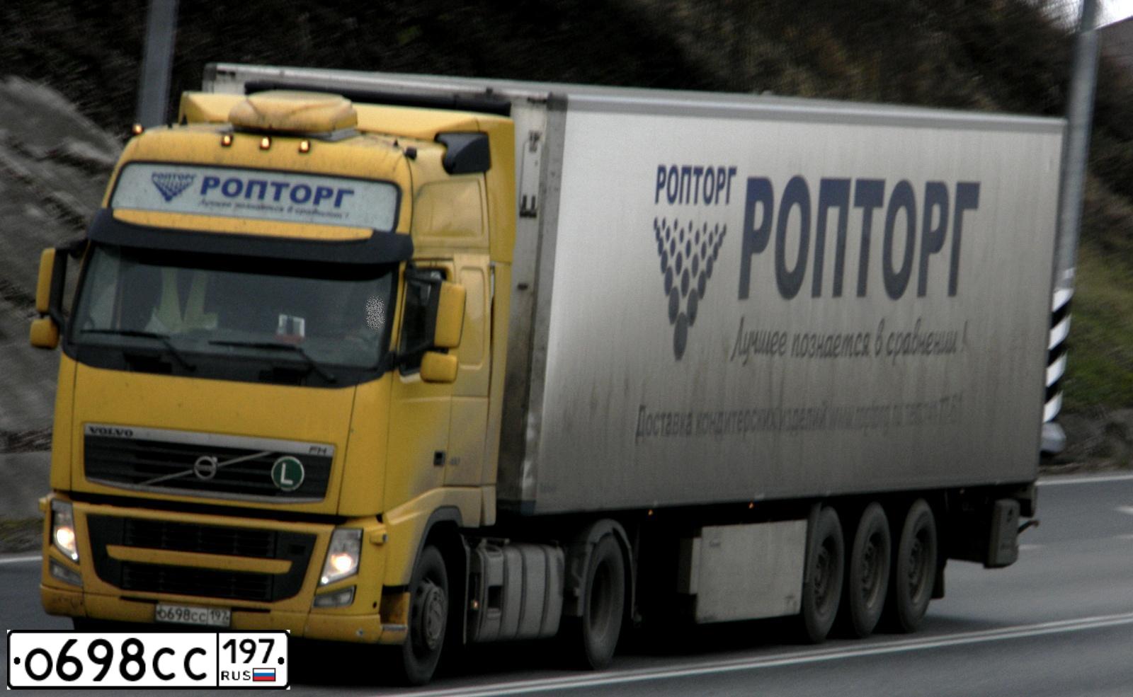 Фото автомобиля VOLVO SERIE FH /4X2/, 2009 — госномер О257ОР790. Цвет: ЖЁЛТЫЙ