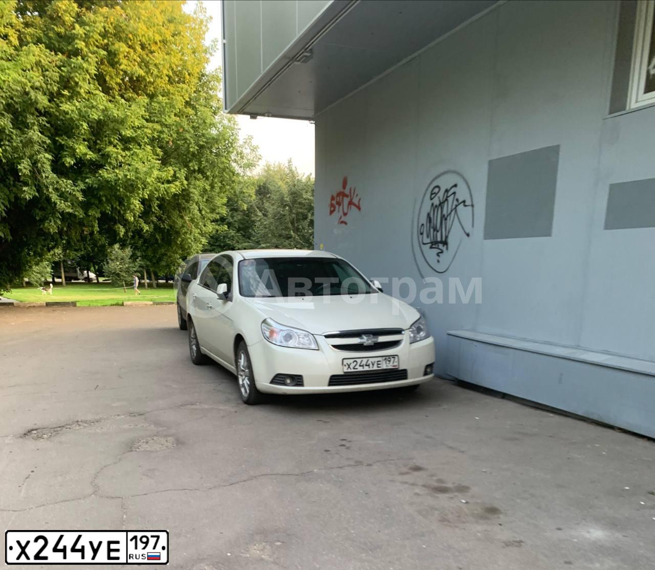 Фото автомобиля CHEVROLET EPICA, 2012 — госномер Х244УЕ197. Цвет: БЕЛЫЙ