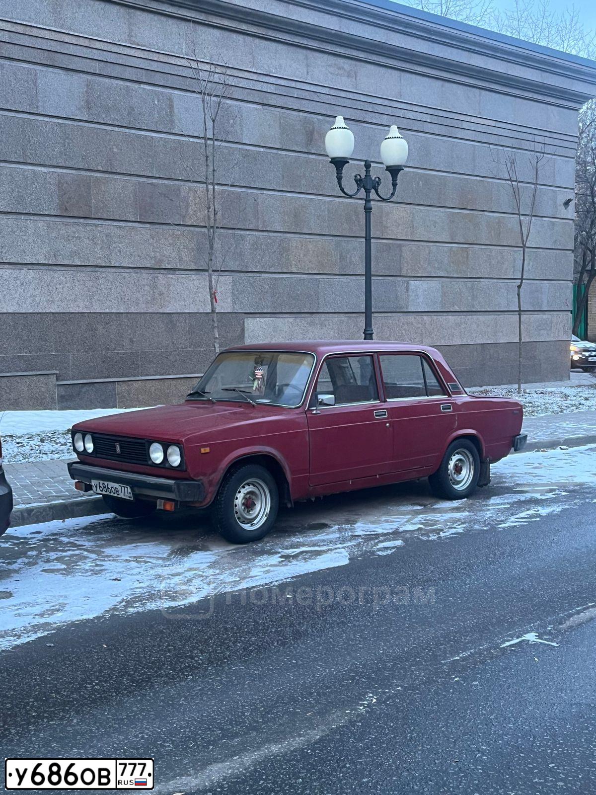 Фото автомобиля LADA 2107, 2003 — госномер О035КА199. Цвет: КРАСНЫЙ ТЕМНЫЙ