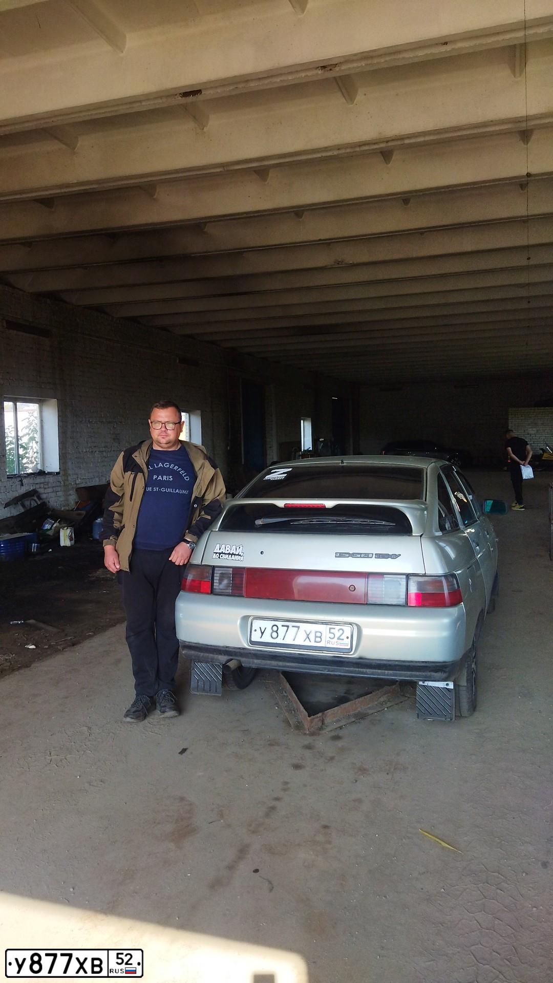 Фото автомобиля LADA 2112, 2002 — госномер У877ХВ52. Цвет: СЕРЕБР.ЖЕЛТО-ЗЕЛЕНЫЙ
