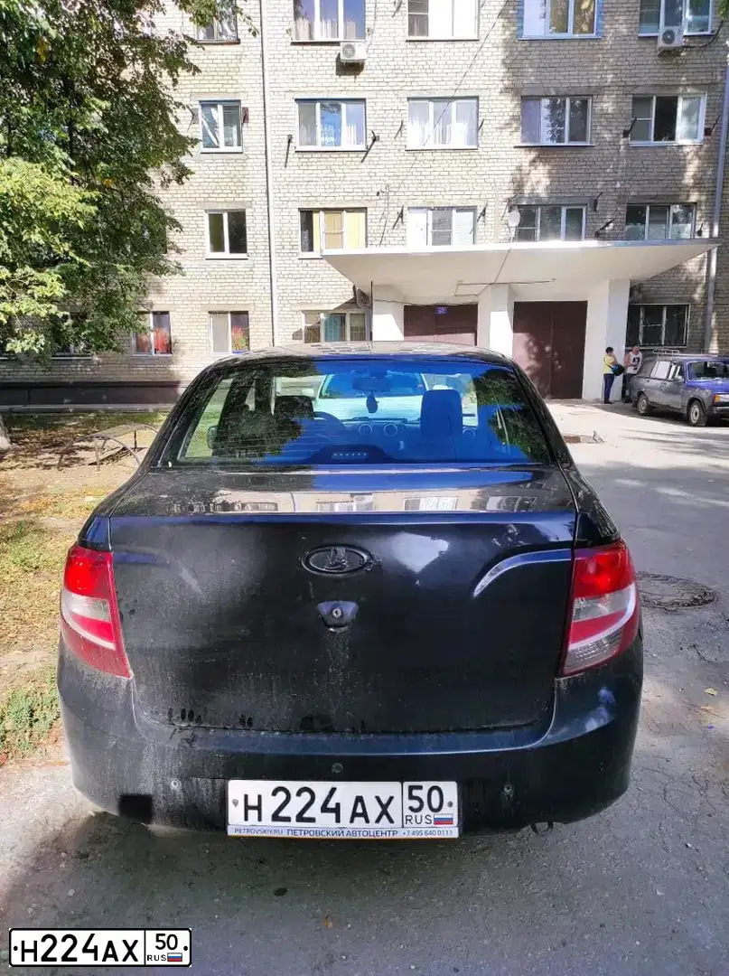 Фото автомобиля LADA 2190 GRANTA, 2013 — госномер У480КА48. Цвет: Сине-Черный