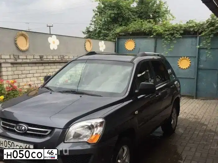 Фото автомобиля KIA SPORTAGE, 2010 — госномер Н050СО46. Цвет: СЕРЫЙ