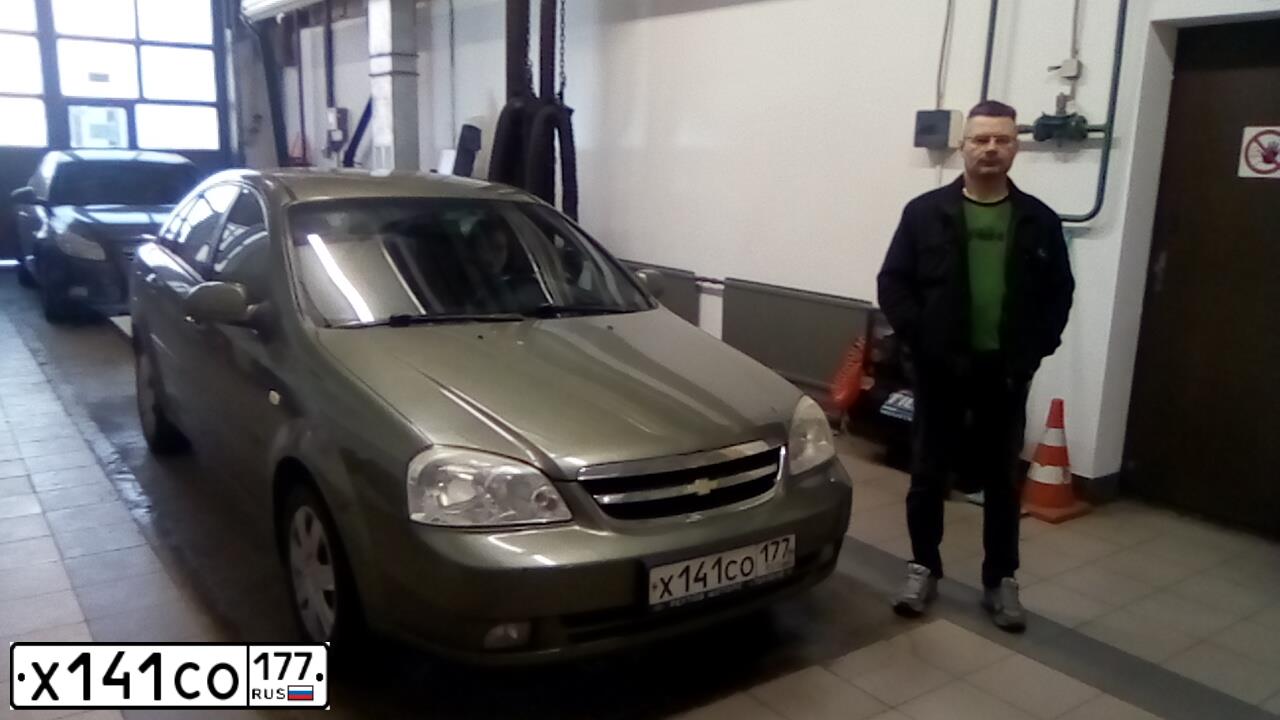 Фото автомобиля CHEVROLET LACETTI, 2006 — госномер Х141СО177. Цвет: ЗЕЛЕНЫЙ