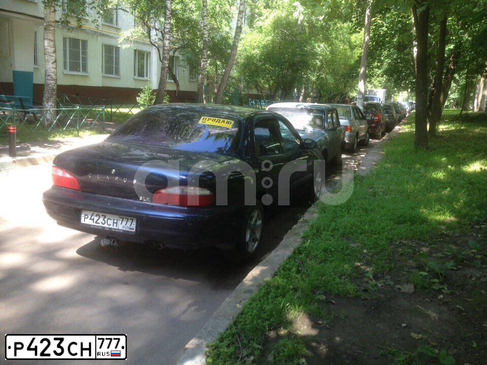 Фото автомобиля KIA CLARUS, 1997 — госномер Р423СН777. Цвет: синий