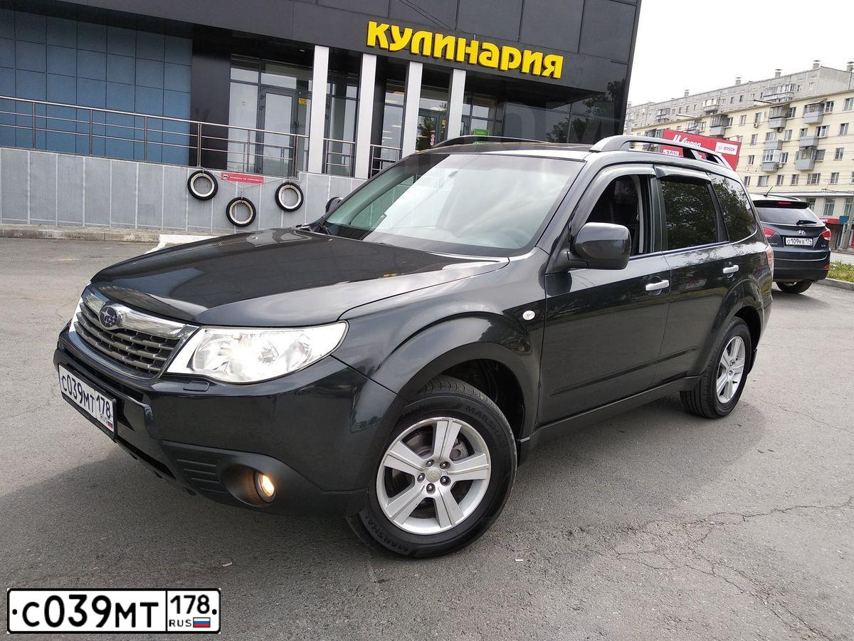Фото автомобиля SUBARU FORESTER, 2009 — госномер К444ТО98. Цвет: СЕРЫЙ