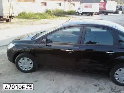 Фото автомобиля FORD FOCUS, 2011 — госномер А701ОЕ190. Цвет: ЧЕРНЫЙ