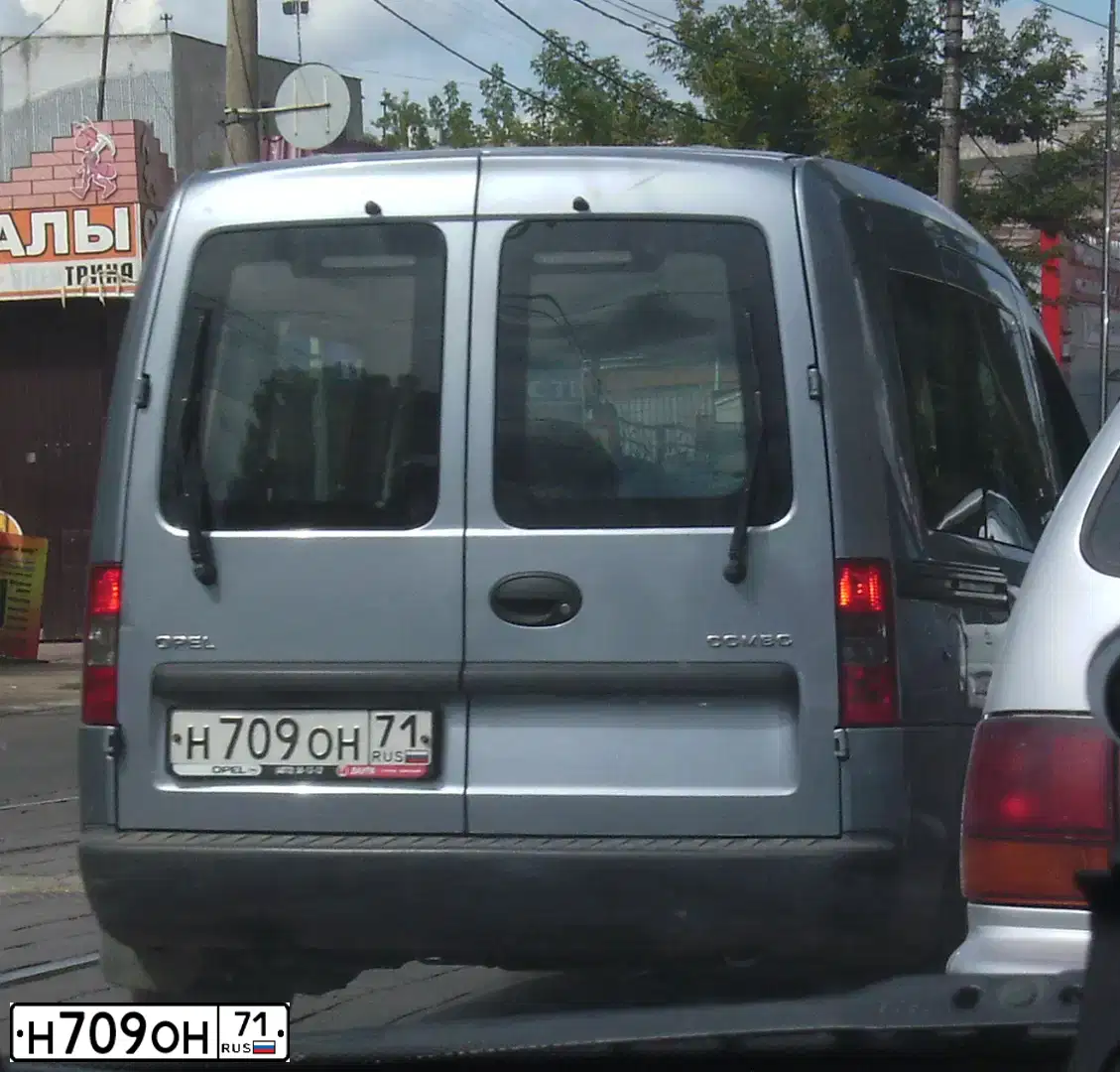 Фото автомобиля OPEL COMBO, 2008 — госномер Н709ОН71. Цвет: СЕРЫЙ