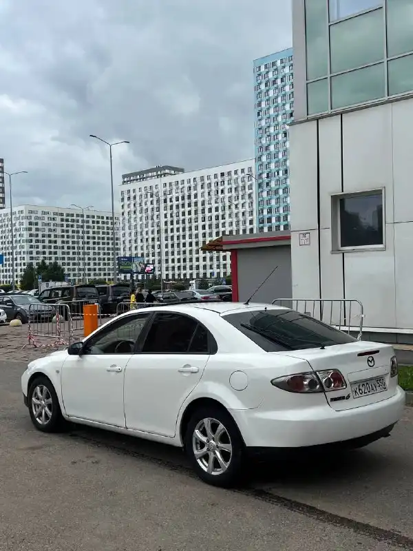 Фото автомобиля MAZDA 6, 2004 — госномер К620АУ550. Цвет: Белый
