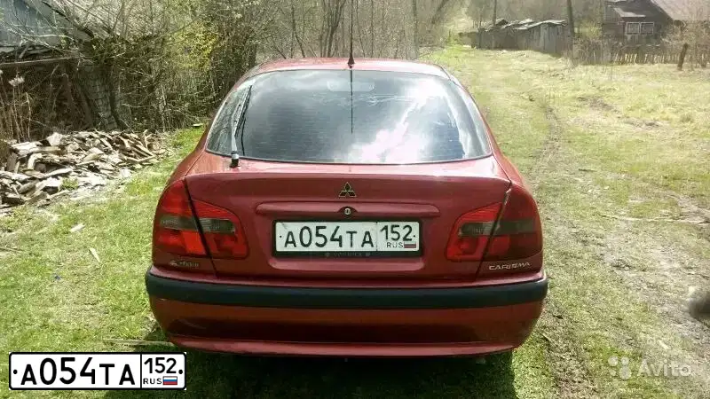 Фото автомобиля MITSUBISHI CARISMA, 1999 — госномер С090НО152. Цвет: Красный