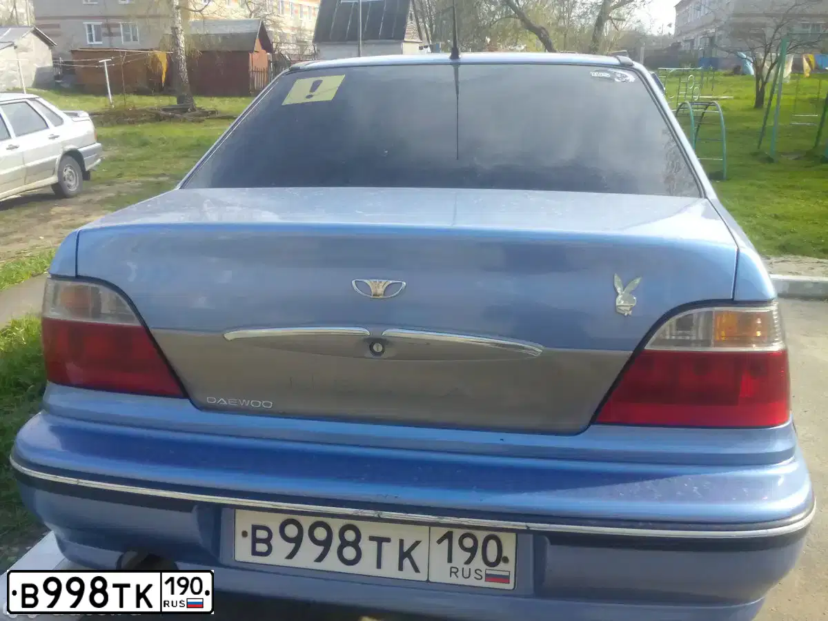 Фото автомобиля DAEWOO NEXIA, 2008 — госномер Р779КН198. Цвет: ВАСИЛЕК